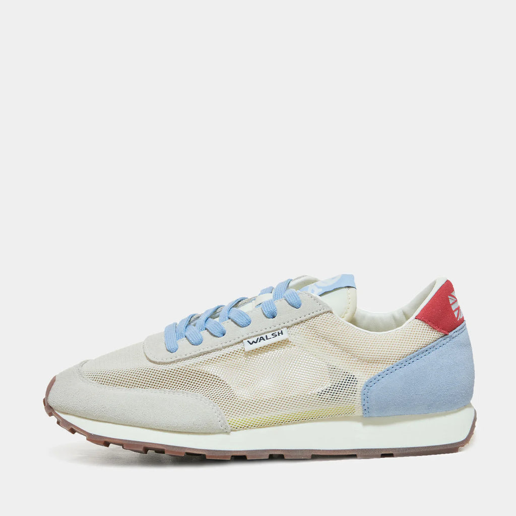 The side view of Norman Walsh LA84 Sky Blue & Red — an Olympics-inspired retro runner with perforated mesh upper, EVA cushioning & rubber outsole. 