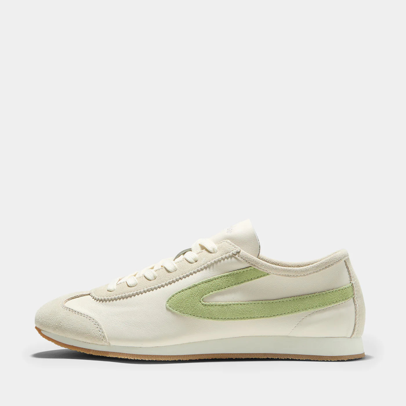 Side view of the Norman Walsh sneaker in Beige and Grass Green, featuring premium full-grain leather and suede textures with a durable rubber sole.