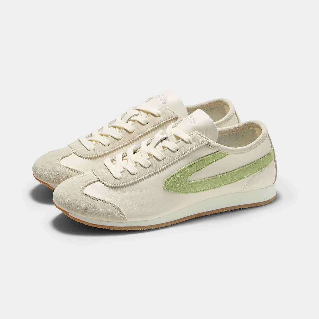 Front view of the Norman Walsh sneaker in Beige and Grass Green, featuring premium full-grain leather and suede textures with a durable rubber sole.