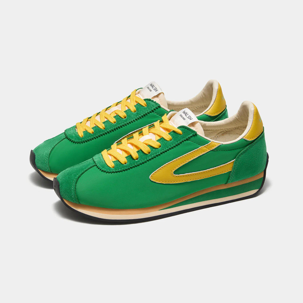 Front view of the London Vintage Green sneaker, showing the refined 1970s Scintilla silhouette and weather-resistant material textures.