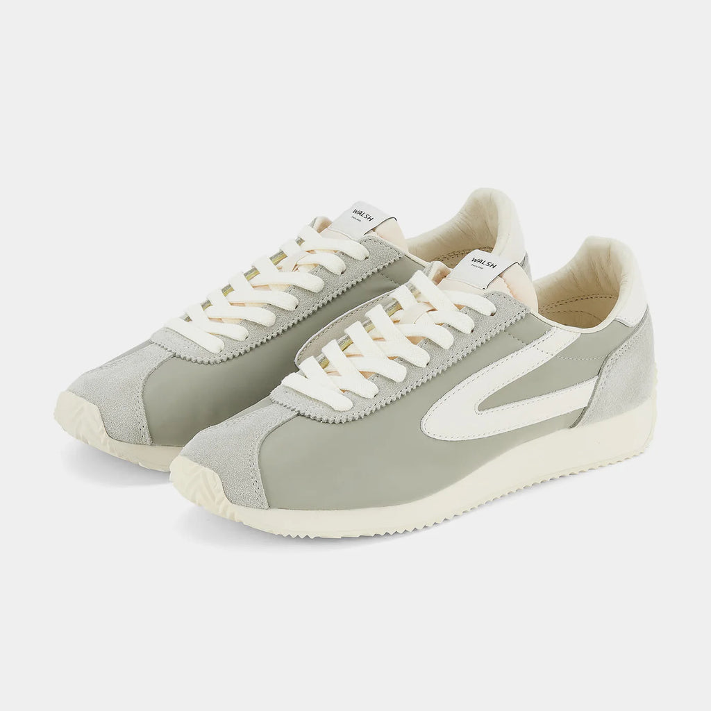 Front view of the London Beige and Bean Green sneaker, showing the refined 1970s Scintilla silhouette and weather-resistant material textures.