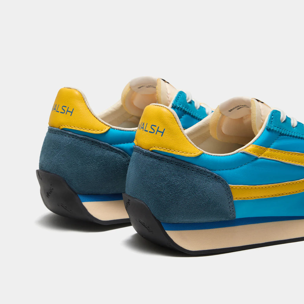 Back view of the London Aqua Blue sneaker, showing the refined 1970s Scintilla silhouette and weather-resistant material textures.