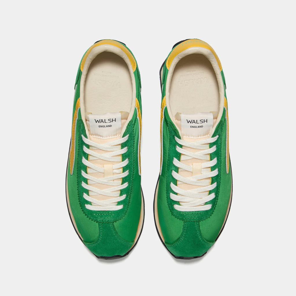 Top-down view of the London Vintage Green sneaker, showing the refined 1970s Scintilla silhouette and weather-resistant material textures.