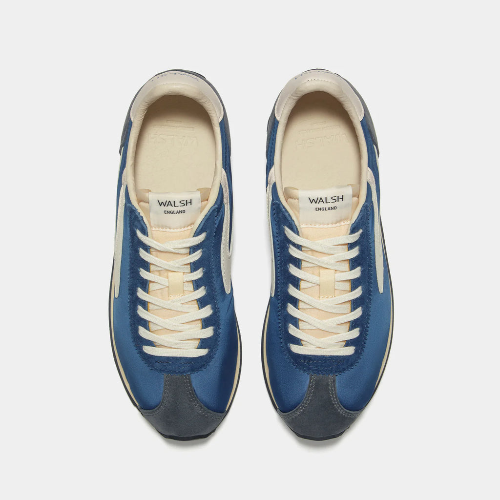 Top-down view of the London Navy Blue sneaker, showing the refined 1970s Scintilla silhouette and weather-resistant material textures.