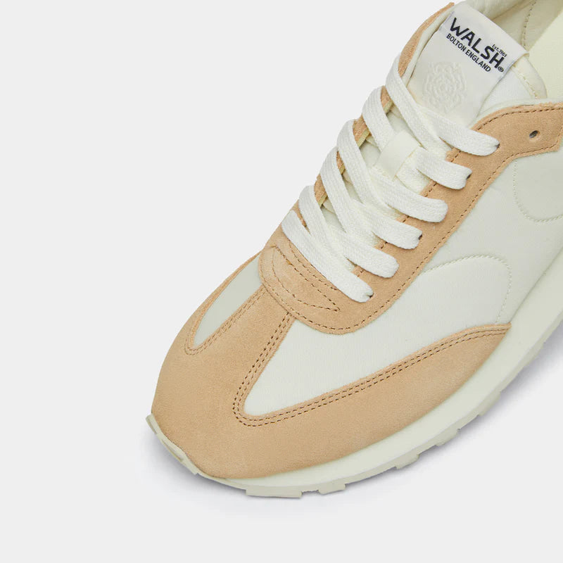 Close-up view of the Thames collection in Beige and Brown, featuring a wide toe box and smooth artistic silhouette