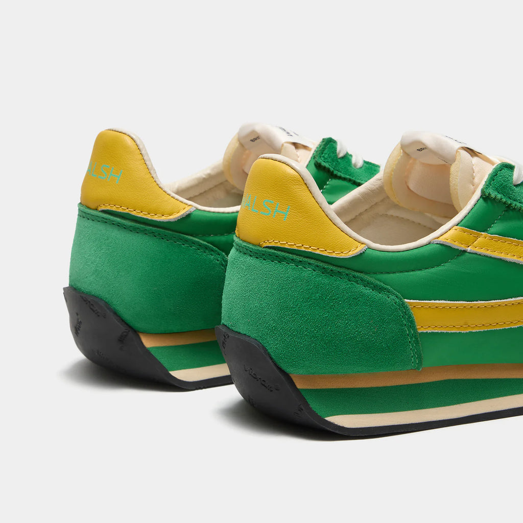Back view of the London Vintage Green sneaker, showing the refined 1970s Scintilla silhouette and weather-resistant material textures.