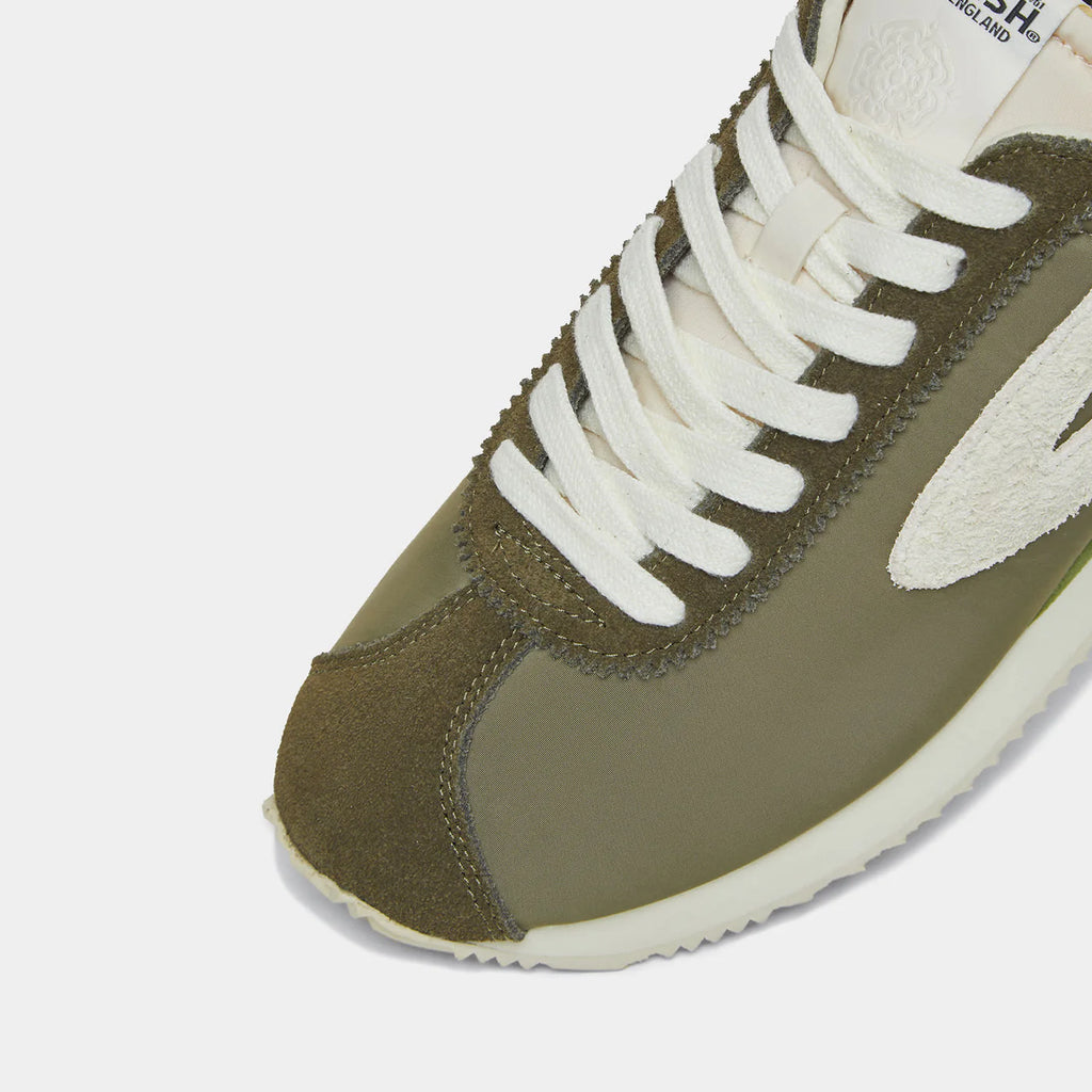 Close-up view of the London Beige & Green sneaker, showing the refined 1970s Scintilla silhouette and weather-resistant material textures.