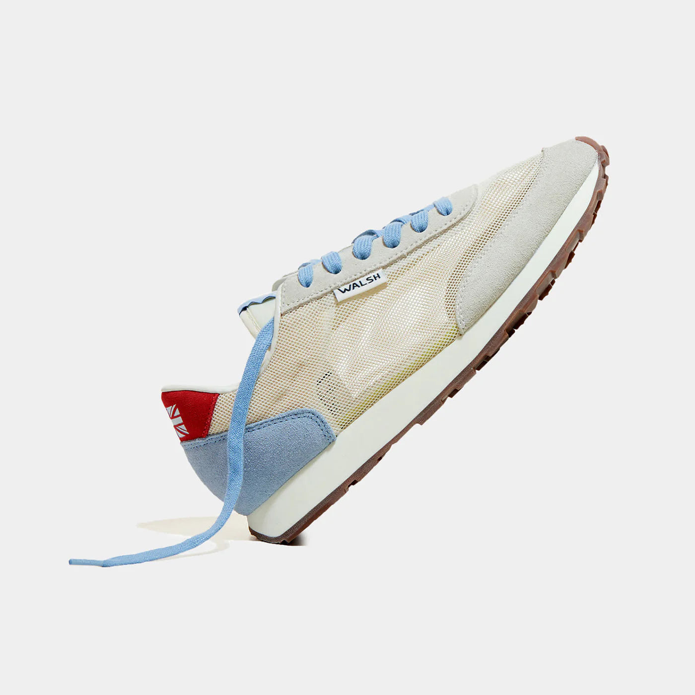 Another side view of Norman Walsh LA84 Sky Blue & Red — an Olympics-inspired retro runner with perforated mesh upper, EVA cushioning & rubber outsole. 