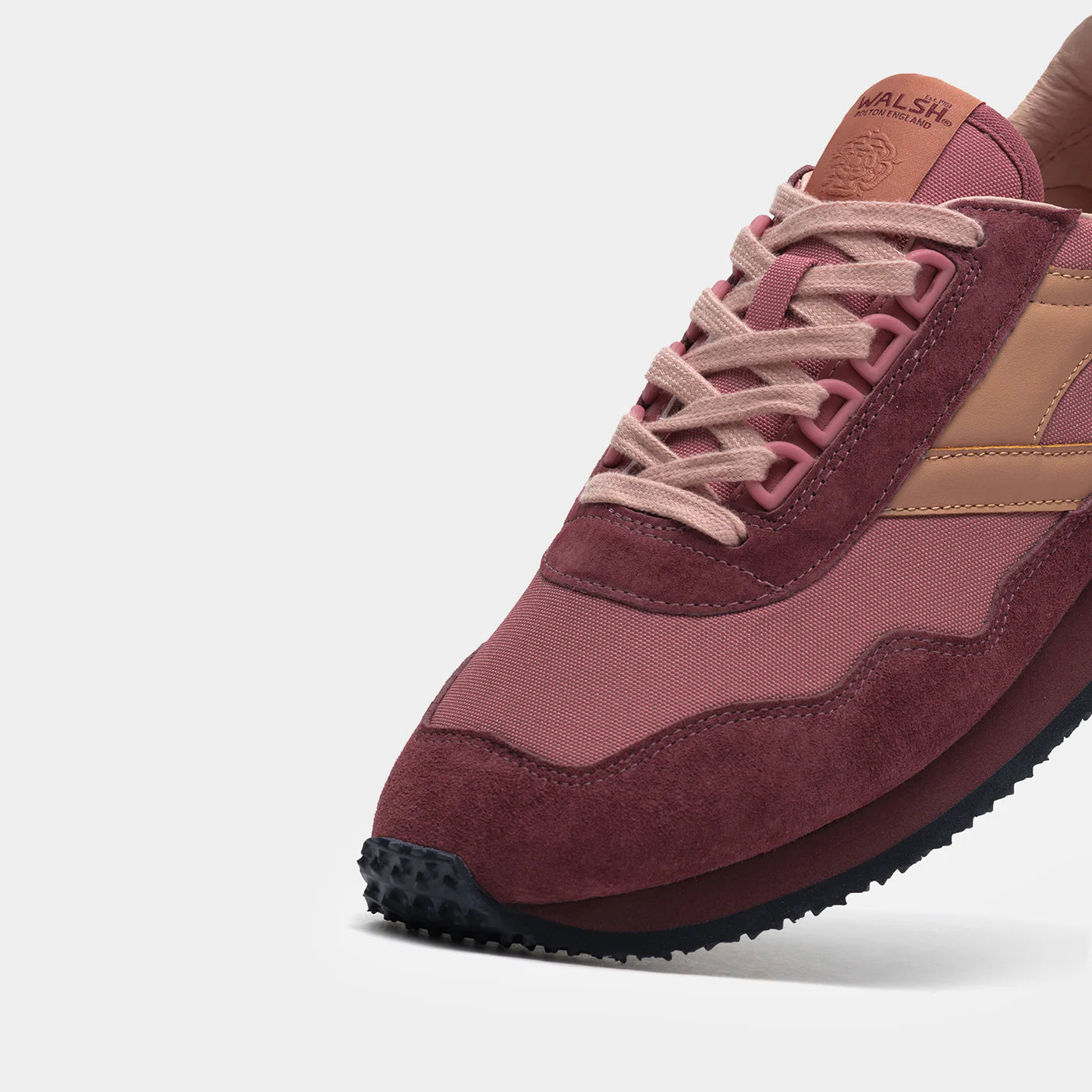 The close-up view of Norman Walsh Rouge & Crimson trainer — a heritage 1981 marathon shoe with EVA cushioning, nylon upper & rubber outsole.