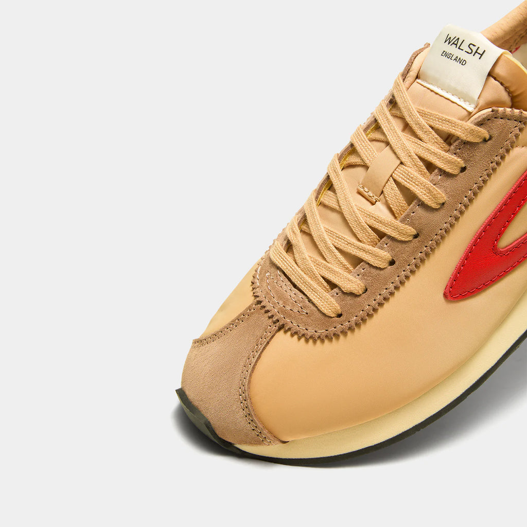 Close-up view of the London Beige and Gray sneaker, showing the refined 1970s Scintilla silhouette and weather-resistant material textures.