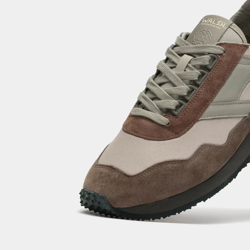 The close-up view of Norman Walsh Ensign Palm & Khaki trainer — a heritage 1981 marathon shoe with EVA cushioning, nylon upper & rubber outsole.