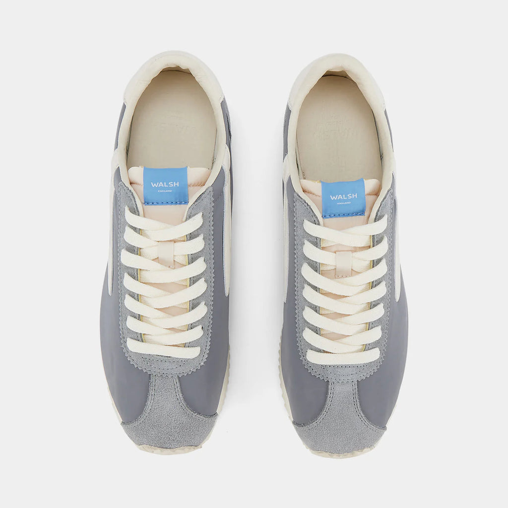 Top-down view of the London Beige and Gray sneaker, showing the refined 1970s Scintilla silhouette and weather-resistant material textures.