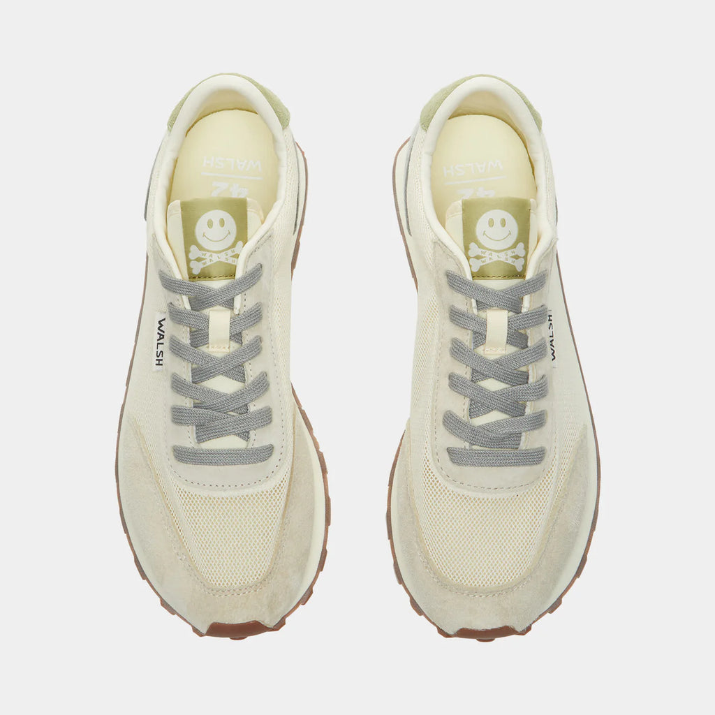 The top-down view of Norman Walsh LA84 Beige & Haze Green — an Olympics-inspired retro runner with mesh upper, EVA cushioning & rubber outsole. 