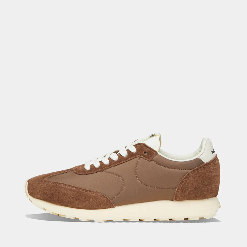 Side view of the Thames collection in Brown and Dark Brown, featuring a wide toe box and smooth artistic silhouette