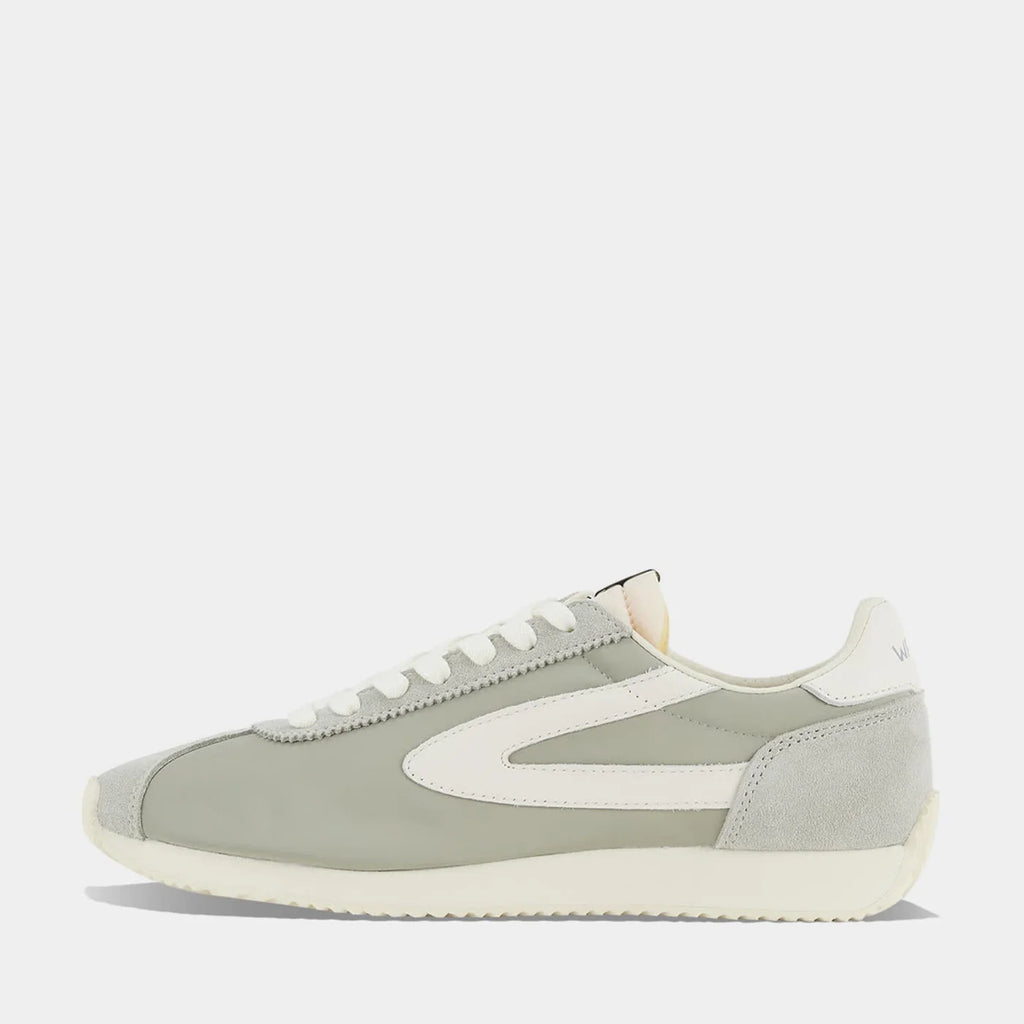 Side view of the London Beige and Bean Green sneaker, showing the refined 1970s Scintilla silhouette and weather-resistant material textures.
